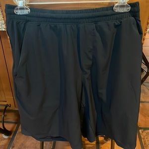 Black medium Lulu lemon Mens shorts. Size Medium. Liner-less Pace Breaker 7”
